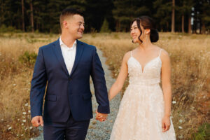 Wedding portrait of a bride and groom outside at Hillockburn Farm in Estacada, OR